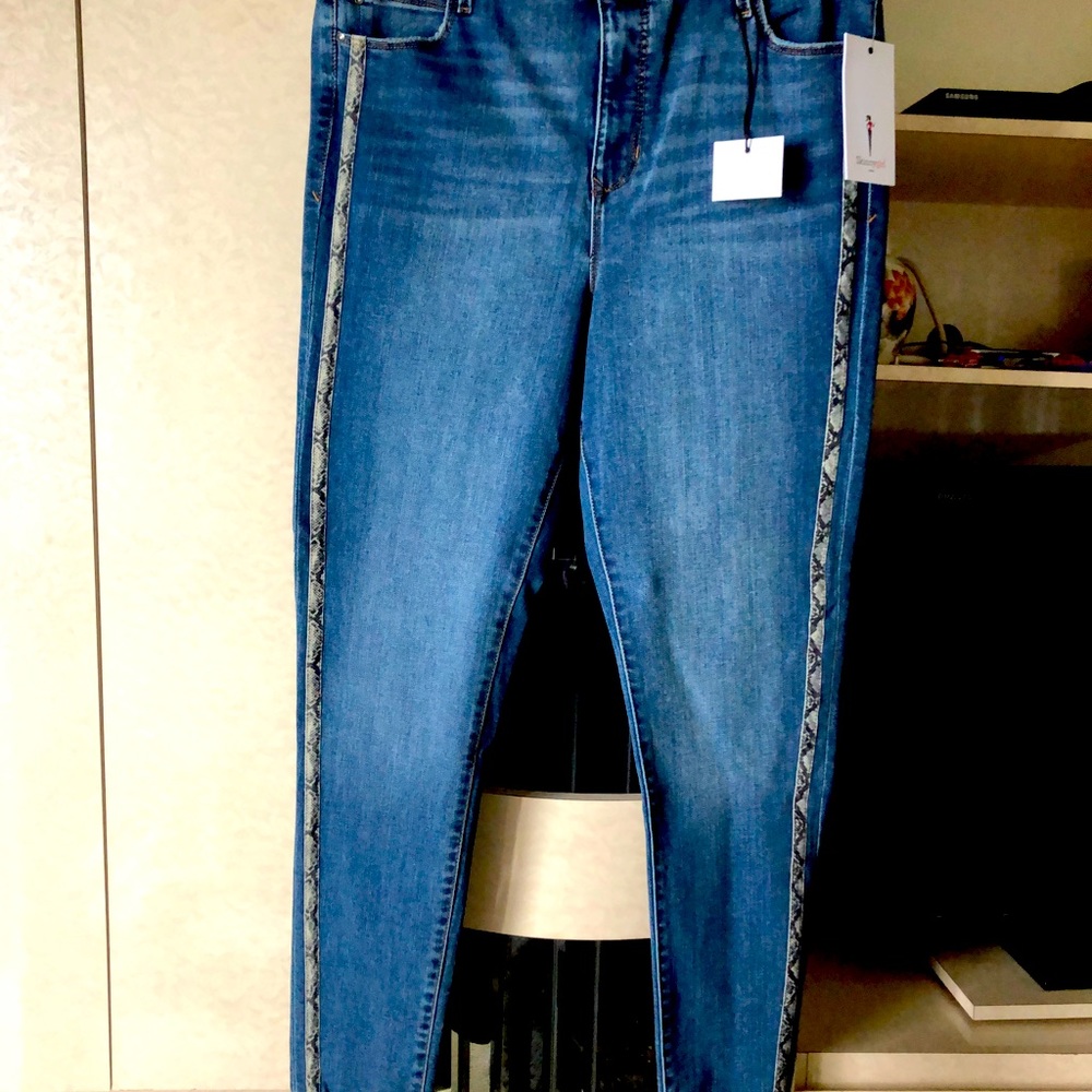 skinny girl skinny jeans with Python trim down the leg.